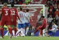 Liverpool thrashes United and snatches the lead