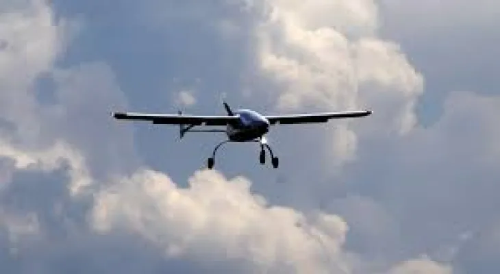 A drone carrying weapons stuck in a tree near the US-Canada border in southwestern Ontario