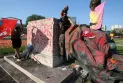 Vandalizing the statue of Queen Victoria in Kitchener and defacing it with red paint