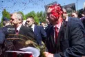 Protesters hit the Russian ambassador in Poland with red paint