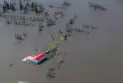 A near-tsunami strikes Manitoba and authorities warn
