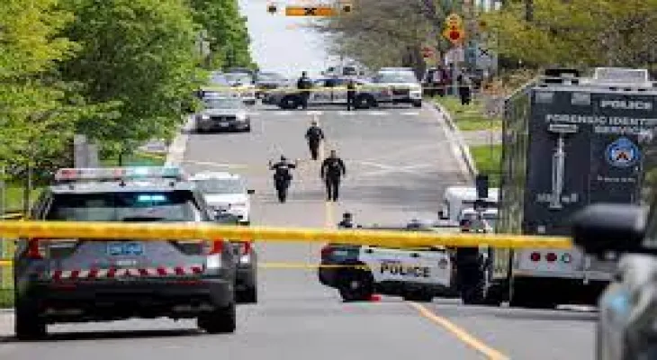 Toronto police kill armed man in front of school