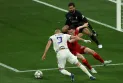 Liverpool and Real Madrid are tied 0-0 at the end of the first half.