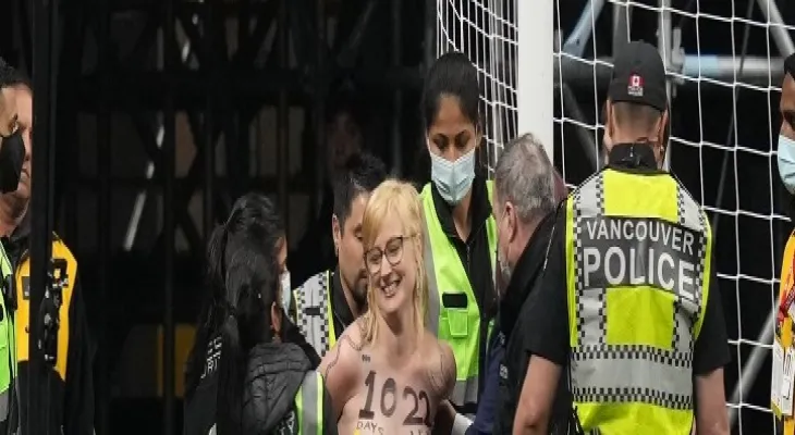 Climate protesters with naked bodies disrupt soccer match in Vancouver