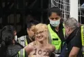 Climate protesters with naked bodies disrupt soccer match in Vancouver
