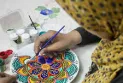 Mandala circles introduce a young Syrian woman to the Guinness World Records