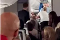 LOT Polish Airlines flight 41 to Toronto makes an emergency landing due to a Canadian passenger attempting to open the plane doors during the flight