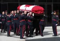 Warmington, President of the Toronto Police Association, expresses his anger during a police officer's funeral