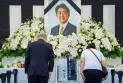 Honoring former Japanese leader Shinzo Abe at a rare official funeral that causes controversy
