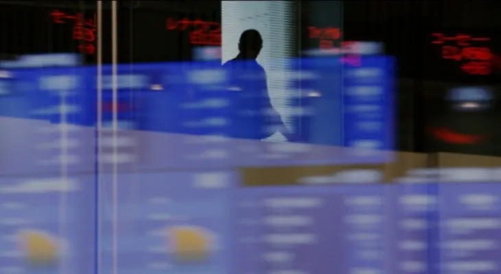 Asian stocks fell after weak earnings pushed Wall Street down