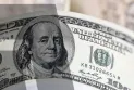 Why did the US dollar price drop despite the interest rate hike?