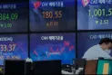 Global stocks fall after Wall Street's weekly loss amid concerns about interest rates