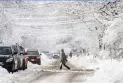 As the storm approaches Ontario and Quebec, wholesale school closures and flight cancellations
