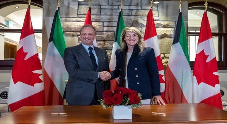 Signing a memorandum of understanding between Canada and Kuwait to develop relations between them