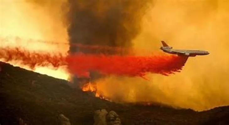 The death of a pilot following the crash of a helicopter fighting wildfires in northwestern Alberta.
