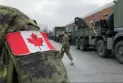 Canada commits to spending 2% of its GDP on its military.