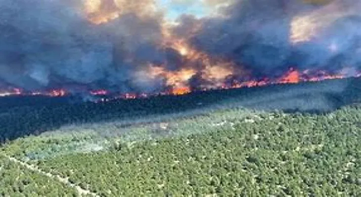 Winds help save Osowiec in British Columbia from raging wildfires.
