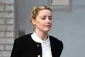 Amber Heard's perjury case regarding the smuggling of dogs to Australia is dropped.