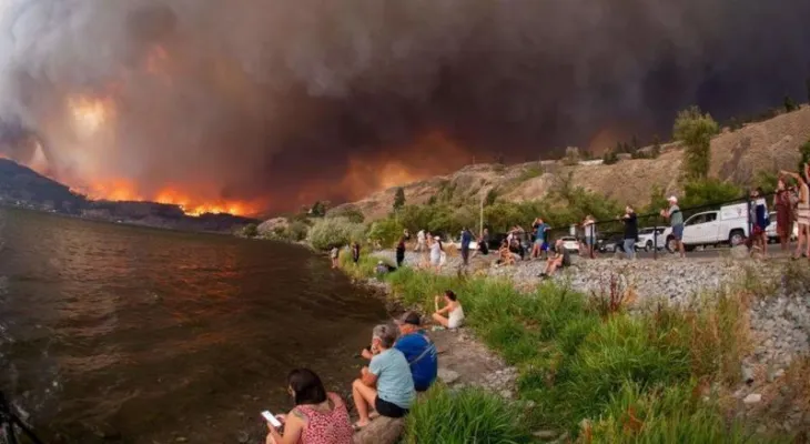 Wildfires in Greece claim the lives of dozens and cause panic among residents.