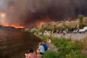 Wildfires in Greece claim the lives of dozens and cause panic among residents.