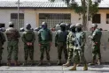Inmates hold police officers hostage inside a prison in Ecuador.