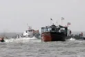 The Iranian Revolutionary Guard announces the seizure of a ship smuggling fuel in the Gulf