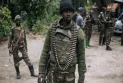The killing of two Chinese nationals, a Ghanaian, and a Congolese soldier by armed men in southeastern Congo.