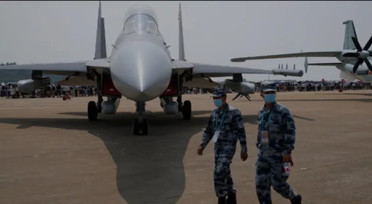 The police are investigating reports that former members of the Canadian Air Force are training pilots in China.