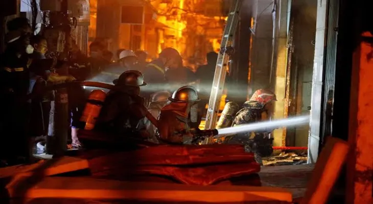 Reports: At least 11 people killed in a residential building fire in Hanoi