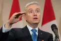 The Canadian government calls for a meeting with the CEOs of five major grocery chains to discuss food prices.