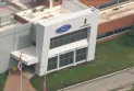 Ford employees in Canada ratify the agreement, setting a precedent.
