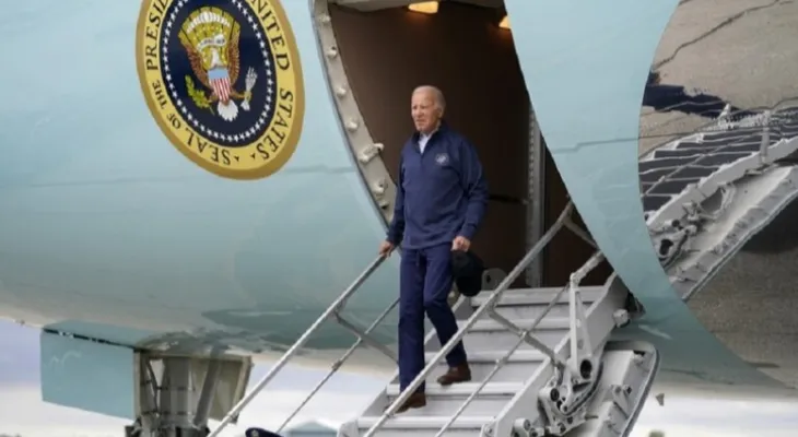 Biden loses his balance again while descending from the presidential plane, and the White House issues a statement about the incident.