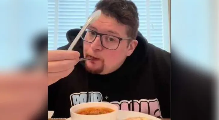 For psychological reasons.. A man eats his food with a metal fork.