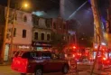 Injuries to two of them, including a firefighter, due to a fire outbreak in three buildings in Queen West.