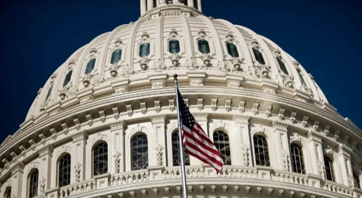 Congress avoids a shutdown by passing an emergency measure that allows for the temporary continuation of federal agency funding.