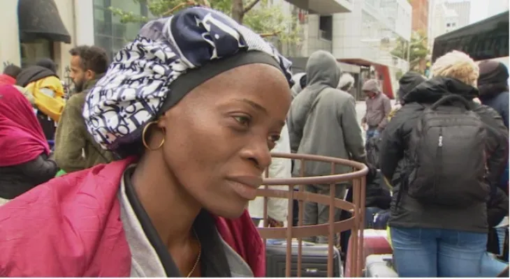 Transferring about 60 asylum seekers exposed to harsh weather conditions to a shelter at a church in Toronto.