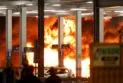 A massive fire at London Luton Airport causes flight cancellations.
