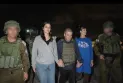 Qatar helps in releasing two American hostages held by the Palestinian Hamas movement.
