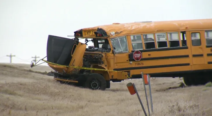 Injury of 5 children and one adult and their transport to the hospital after a school bus crash north of Calgary
