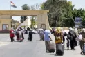 Hundreds of Canadians are stranded at the Gaza border waiting to exit through the border crossing in Egypt