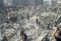 The United Nations lowers its flags in mourning for the lives of its staff in Gaza