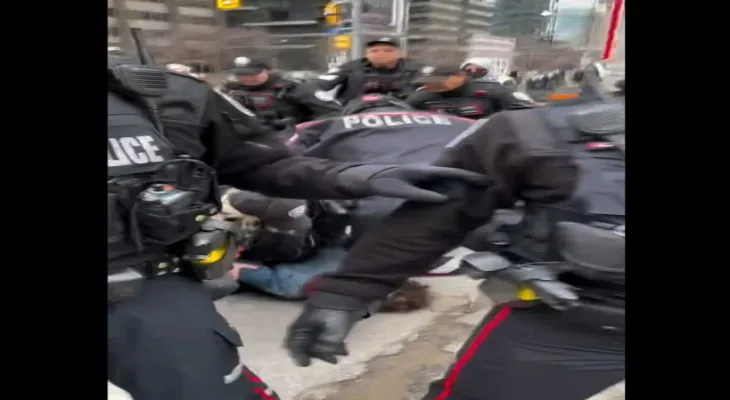 Toronto: Video of a police officer pressing his knee on a protester's neck sparks outrage, and the police deny the incident.