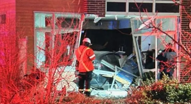 Five people injured after a car crashes into a house in North York