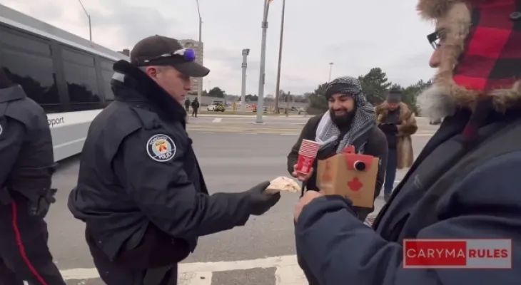 Toronto police chief apologizes after a video of officers bringing coffee and donuts to protesters sparks outrage