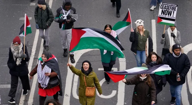 A global day of protests attracts thousands in London and other cities in pro-Palestinian marches