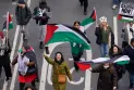 A global day of protests attracts thousands in London and other cities in pro-Palestinian marches