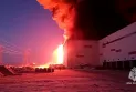 A massive fire engulfs a warehouse in Russia outside the city of Saint Petersburg