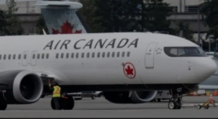 Peel Police: Passenger Tried to Open Airplane Door During Flight to Toronto