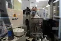 AI-guided robots performing laboratory tasks in a Vancouver hospital