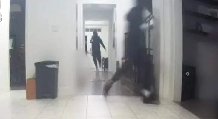 Armed masked men raid a house north of Toronto, beat its residents and hold them hostage.